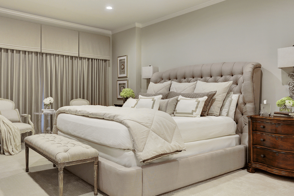 Master bedroom with a mix of modern and traditional furniture.