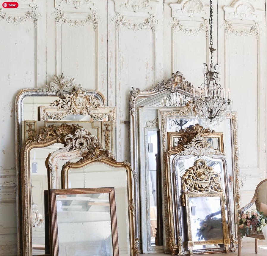 French Home Interiors Elements in Mirrors and Paneling with furniture.
