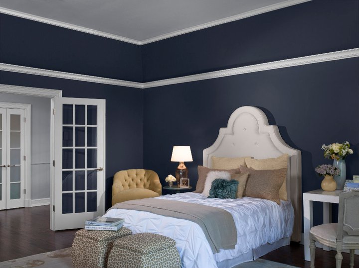 Master Bedroom painted in dark navy color by Benjamin Moor Paint. Best paint colors for a bedroom.