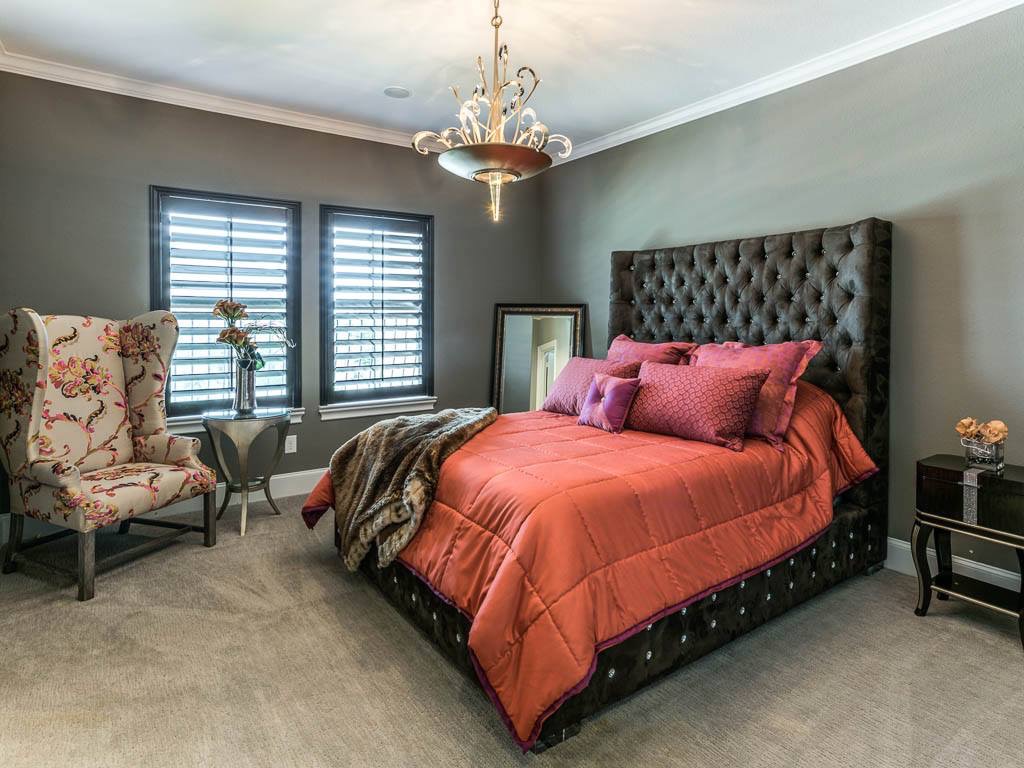 Master bedroom shutters in a dark color.