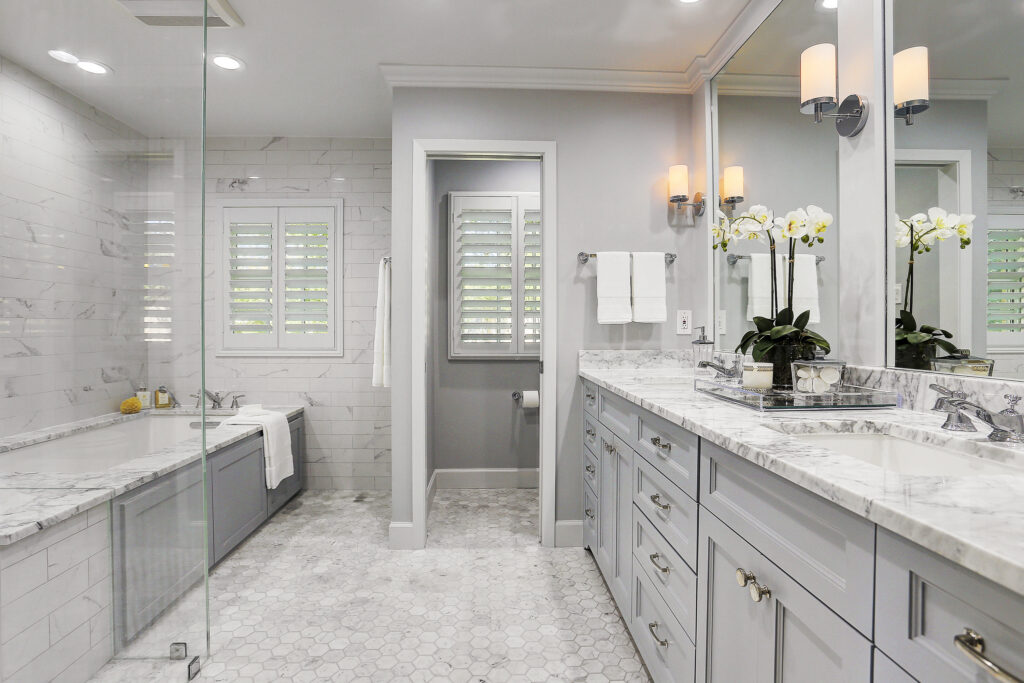 Wood shutters installed in a master bath in houston.