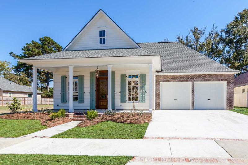 Houston Home with traditional louvered Exterior Shutters.